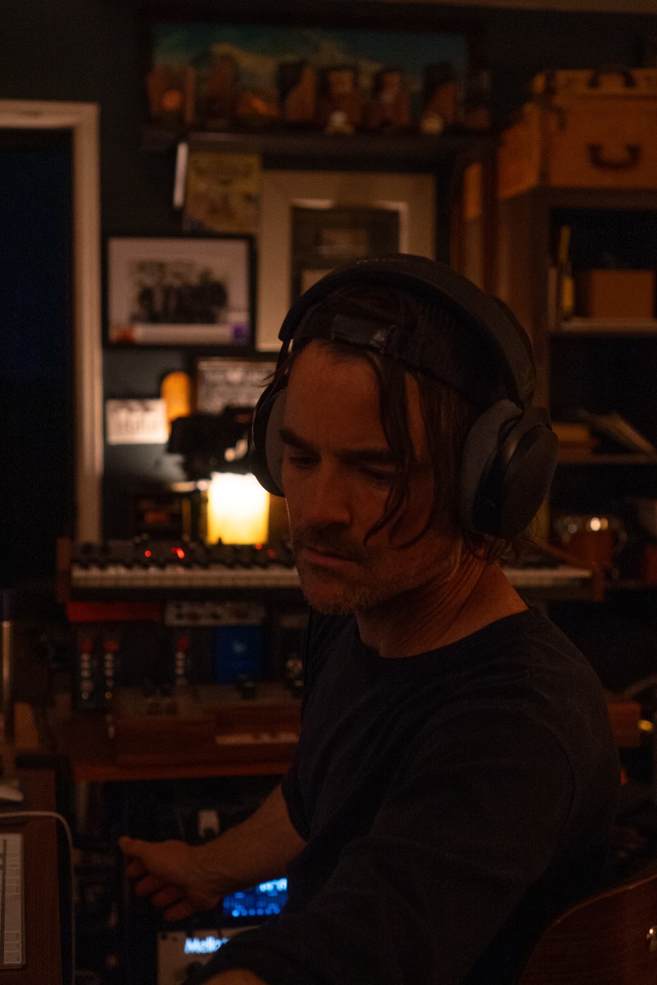 Puff Piece musician listening in the studio