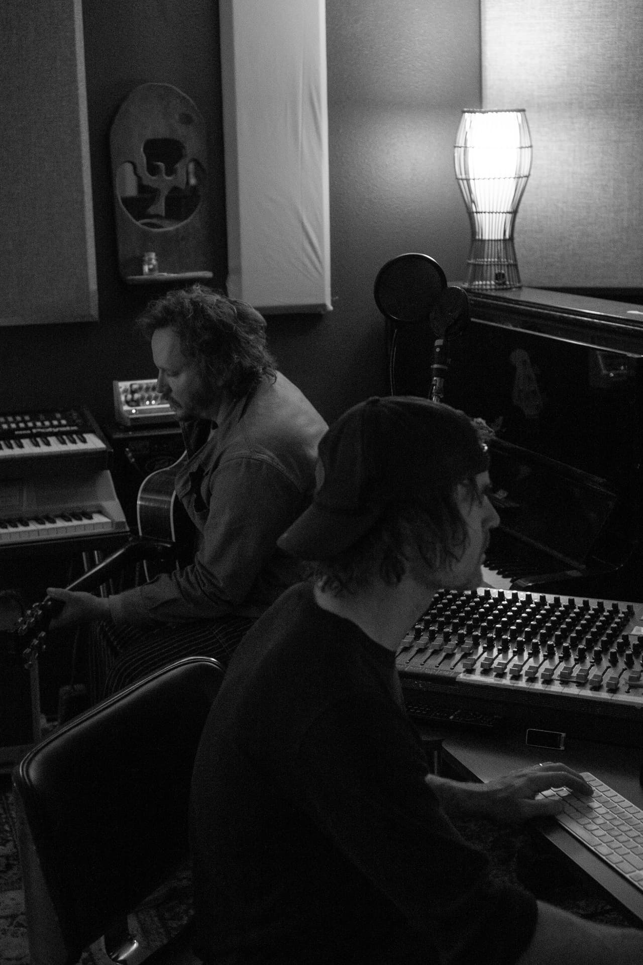 Puff Piece musicians recording together in the studio